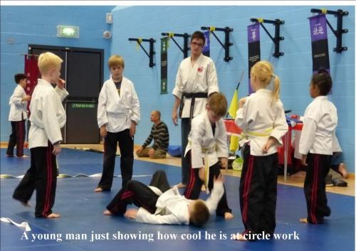 Juniors a young man showing how cool he is at circle work