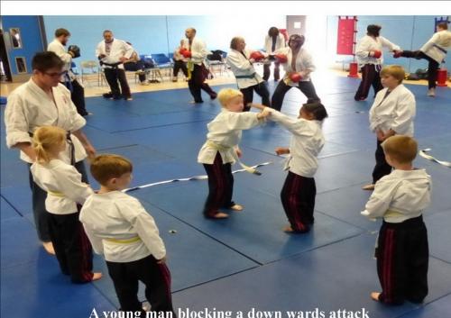 Juniors blocking a down  attackwards