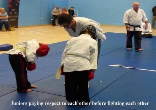 Juniors junior  martial artists paying respect